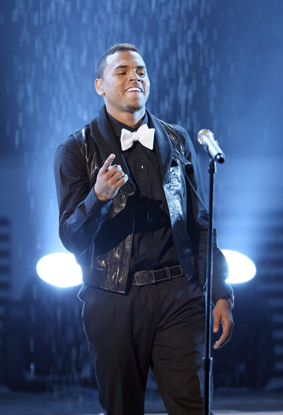 Chris Brown performs in a bow tie, tuxedo shirt and leather vest at the 2008 