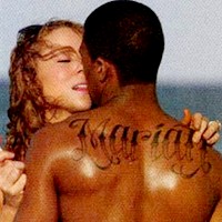 [Image: nick-cannon-e2809cmariahe2809d-back-tattoo.jpg]