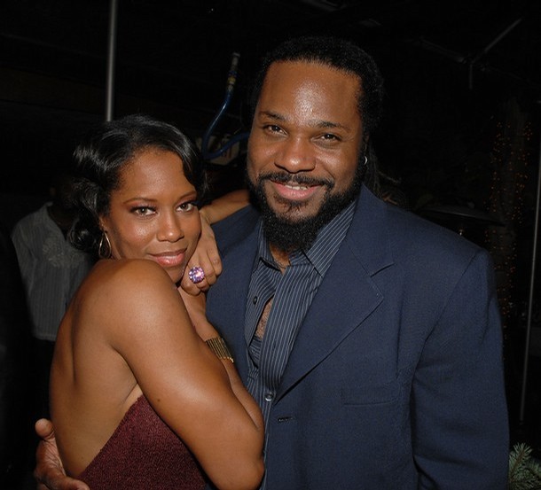 Answer - First Class Fashionista Malcolm Jamal Warner And Wife.